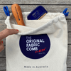Showing contents of Super EEZY™ large storage bag - Super EEZY™ and the EEZY™ fabric comb inside