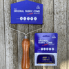 Bright blue Eezy Comb and Super Eezy Comb packaging material around fabric combs. Wooden Handle. Guaranteed to last a life time or two.