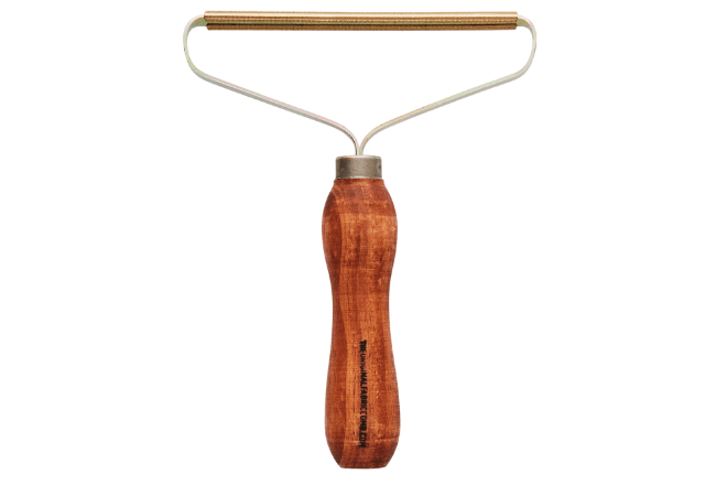 Super EEZY™ Fabric Comb, Australian FSC Certified pine handle, ergonomic shape to fit comfortably in hand. Angled head, Australian steel, nickel-plated so it never rusts. Brass teeth to gently remove dog and cat hair, pilling, dust and lint from knits and soft furniture. Australian Made, designed and owned.